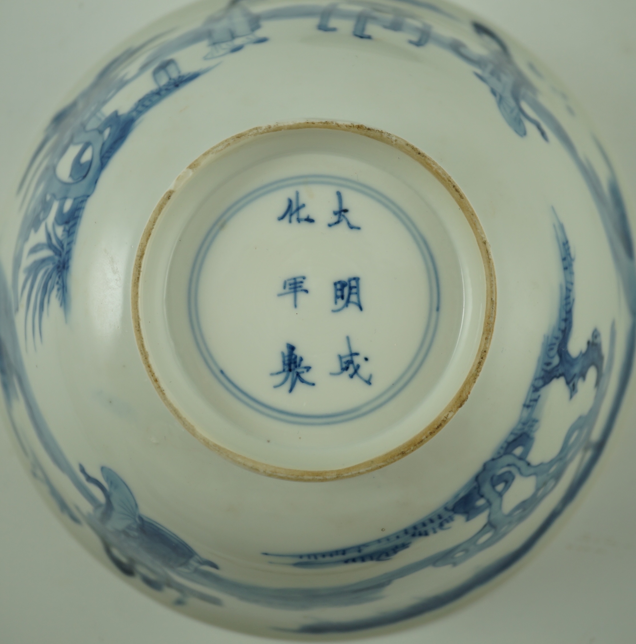 A Chinese blue and white ‘ladies’ bowl, Kangxi period, 15.5cm diameter, wood stand